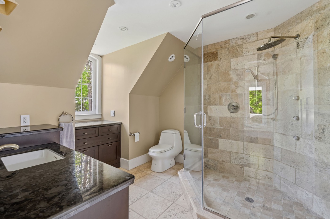 Spa-inspired bathroom with rainfall shower